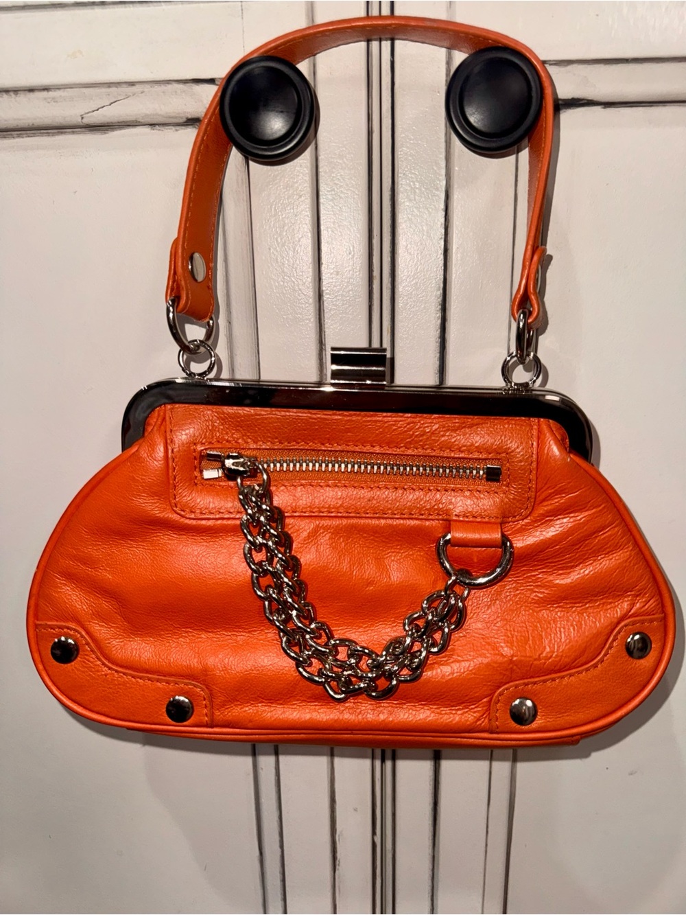vintage Y2K-era Wilsons Leather Maxima orange leather kiss-lock mini bag